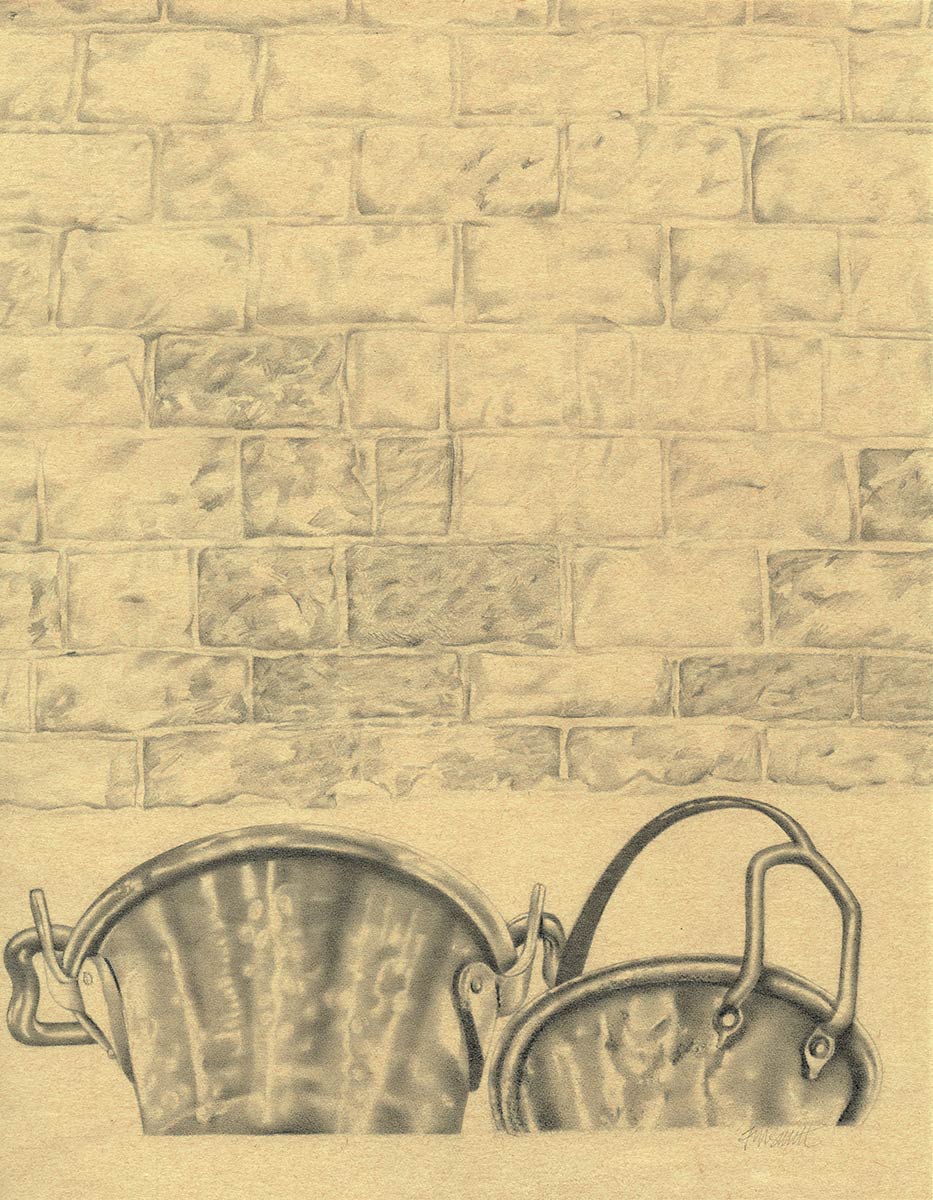 Two cookong pots in front of a brick wall