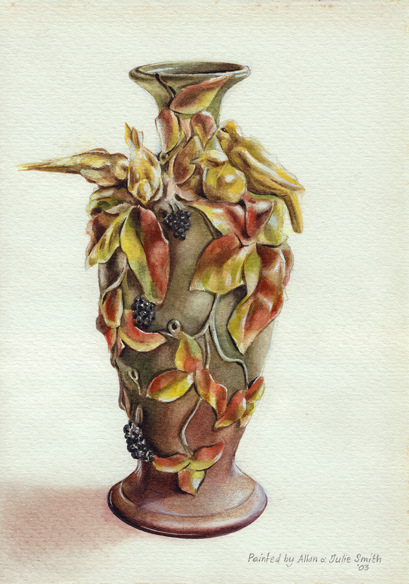 vase with birds on it